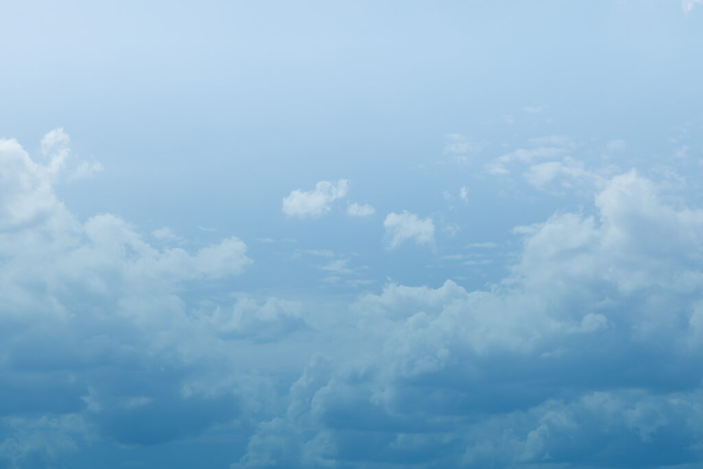 Cloud background with blue gradient overlay
